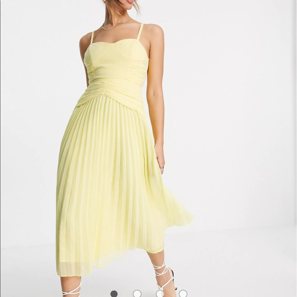 Cup pleated midi cami midi dress in lemon yellow. Posted on site currently
